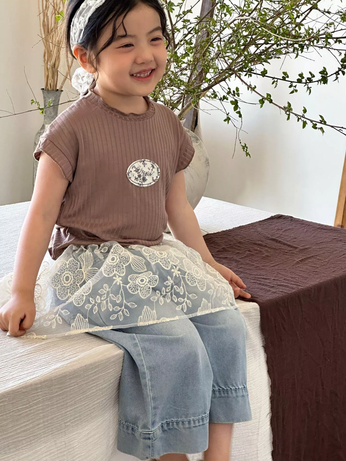 韓系洋氣蕾絲刺繡屁簾半身裙