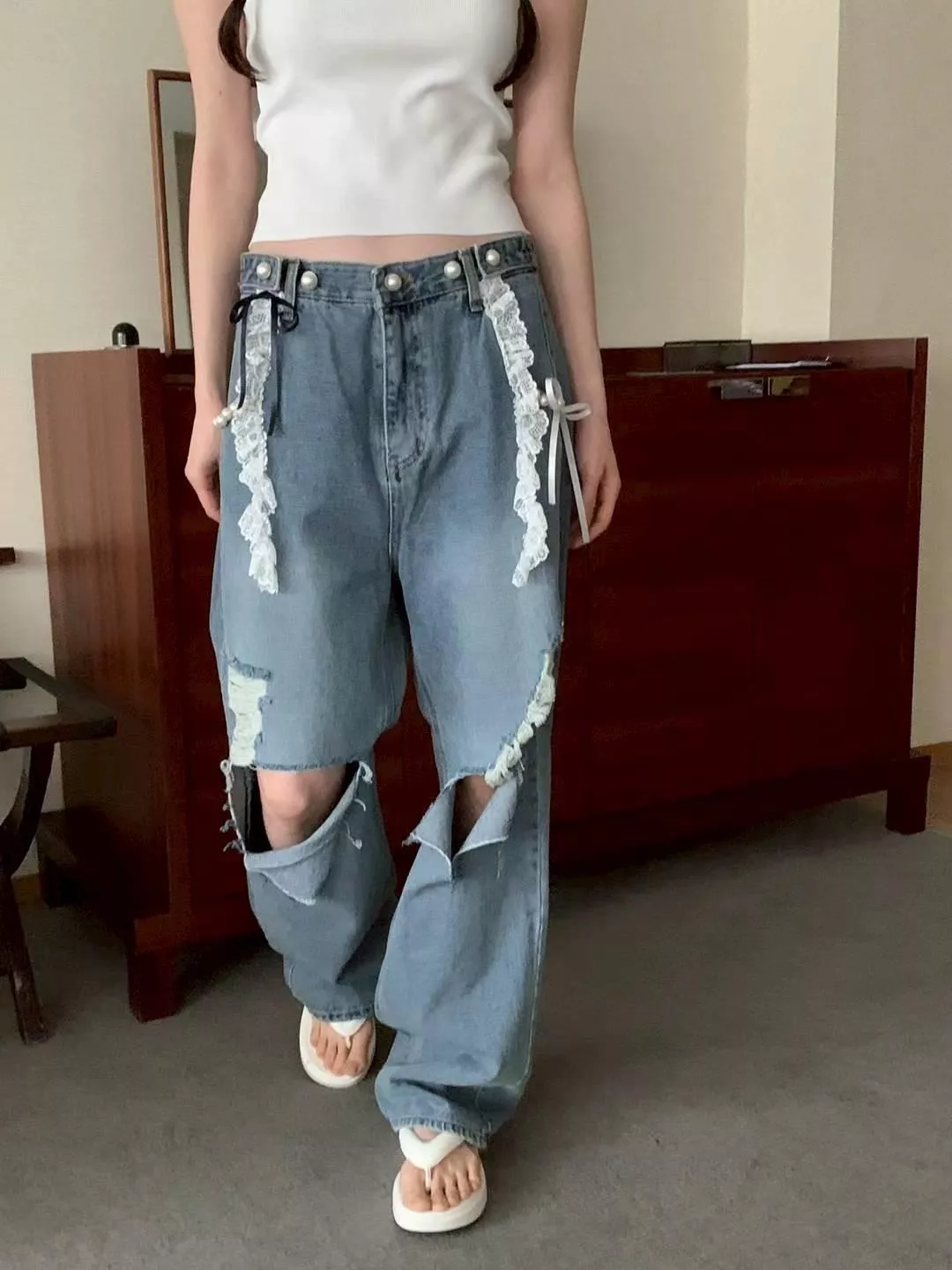 蕾絲刷破邀可調節牛仔褲