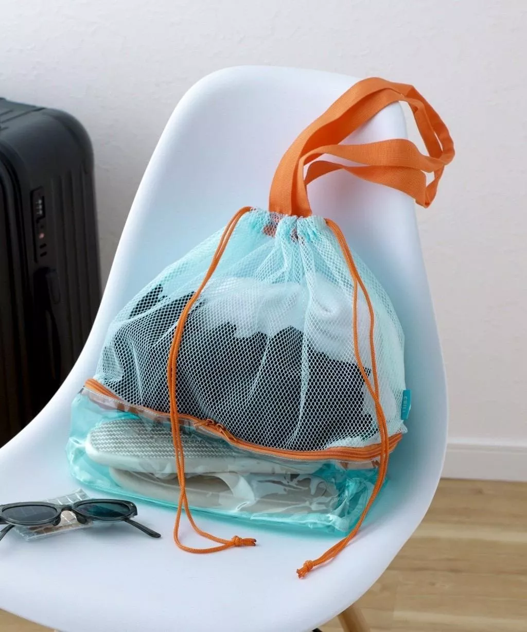 日本 3COINS 兩層網眼抽繩包