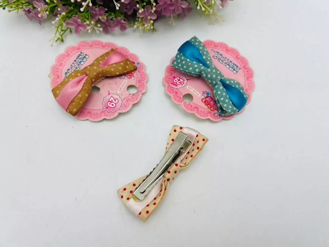 廠商現貨；隨時斷貨。圓點滾緞蝴蝶夾壓夾