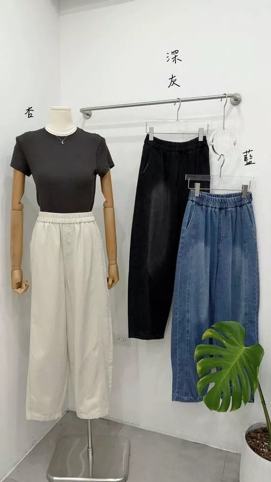 鬆緊薄料彎刀牛仔褲