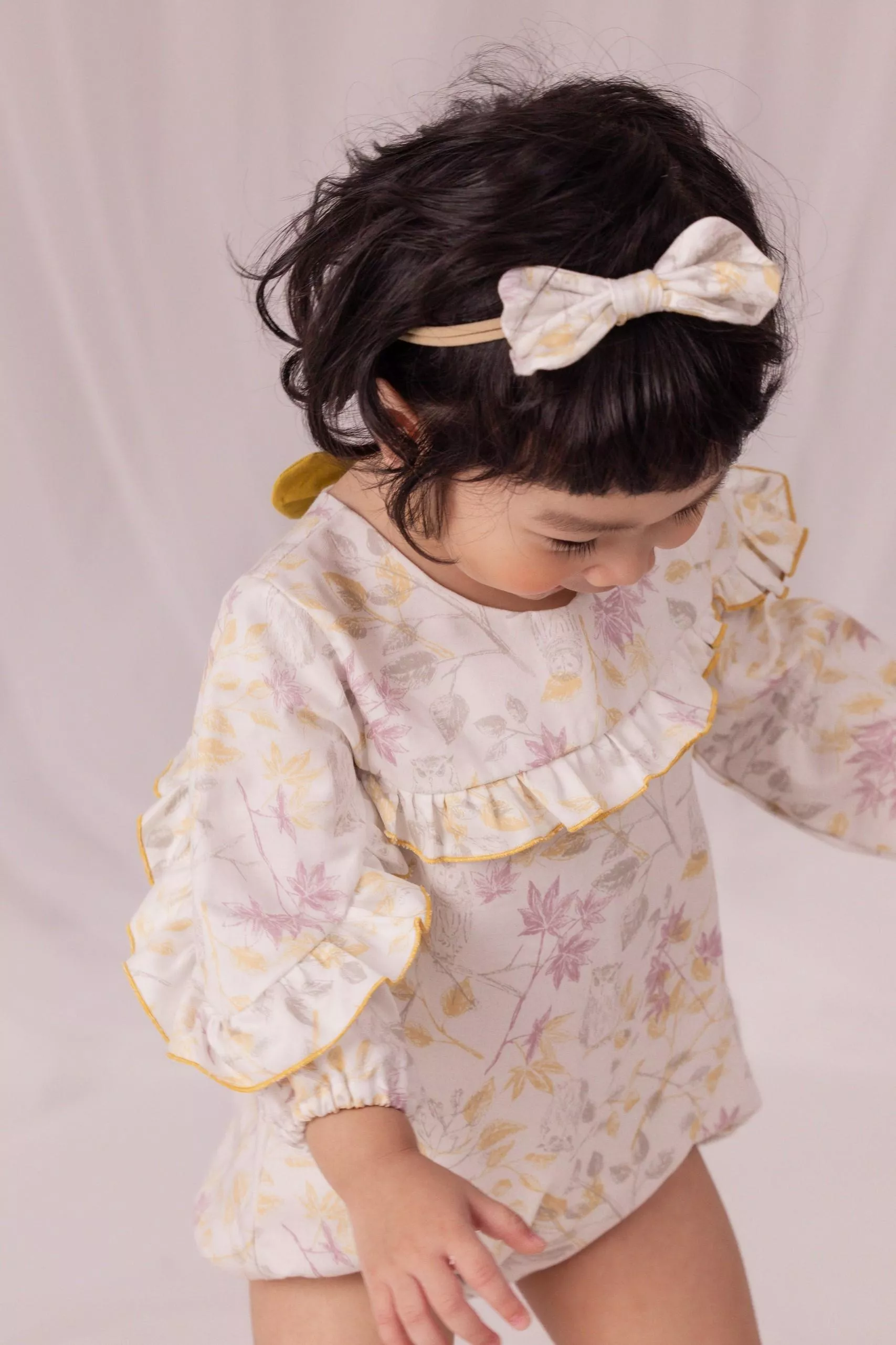 雪鴞羽毛袖包屁衣