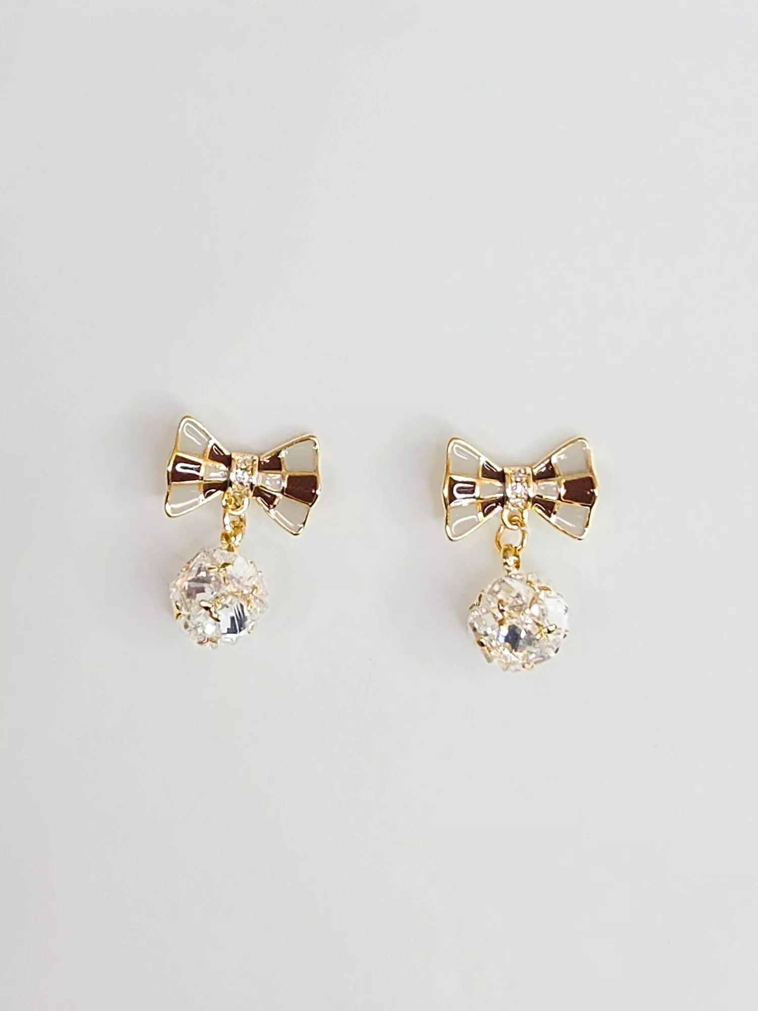 微光蝴蝶結鋯石耳針｜精緻不浮誇首選