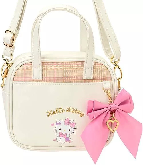 ☻｜JP#三麗鷗#凱蒂貓#心絲帶#米：手提肩背包(約17×7×15cm/提帶25cm/背帶長68~118cm)。