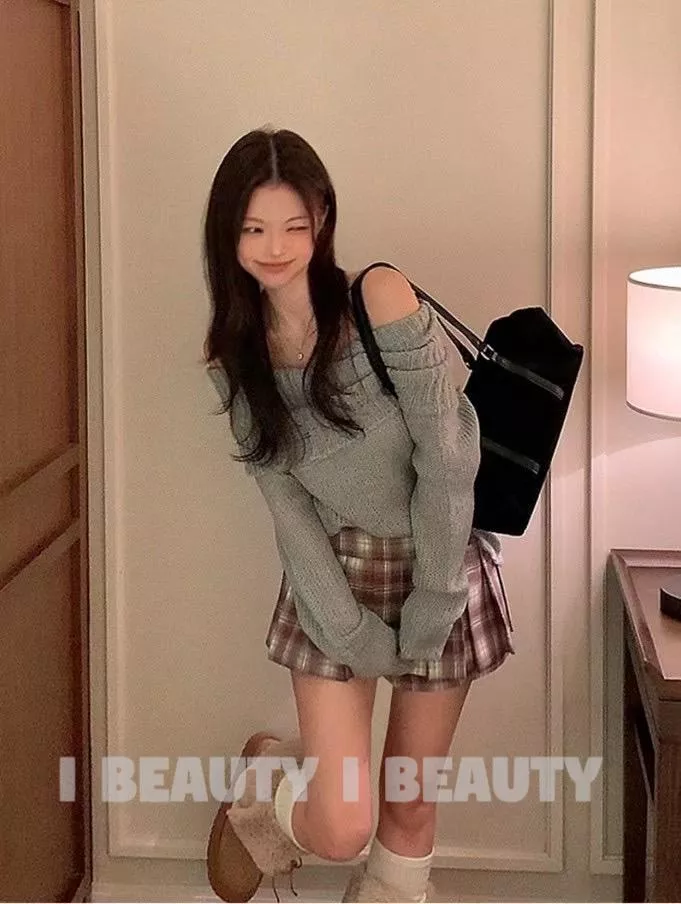 氣質女孩ㄧ字領抓破上衣