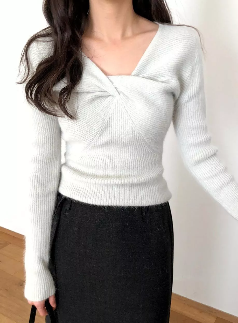 (ordinairement) 紐結針織上衣