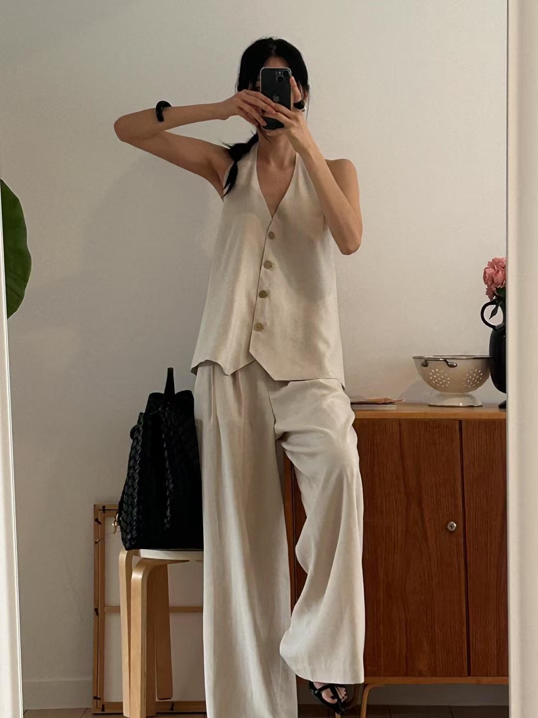 0503 掛脖背鬆緊排扣背心