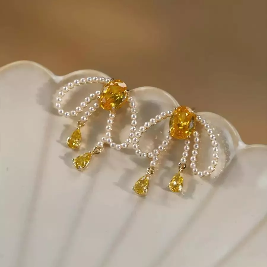 垂墜感珍珠蝴蝶結耳夾