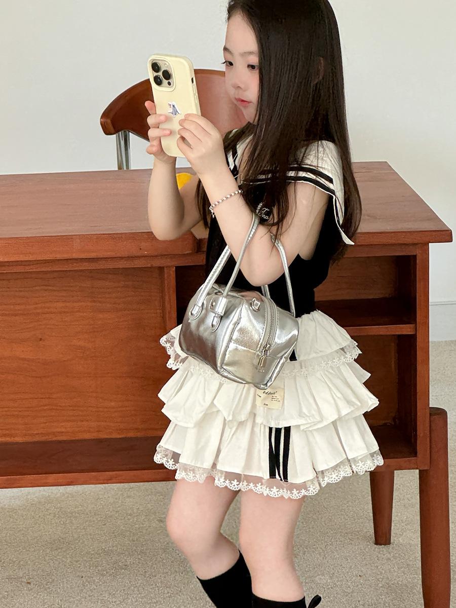 〔90-150〕甜酷撞色織帶蕾絲蛋糕短裙（內有安全褲）