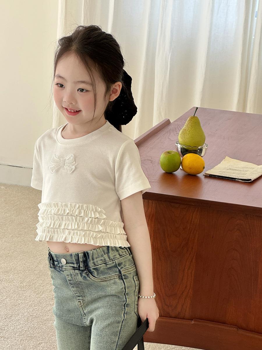 〔90-150〕甜感亮片蝴蝶結拚花邊短版上衣