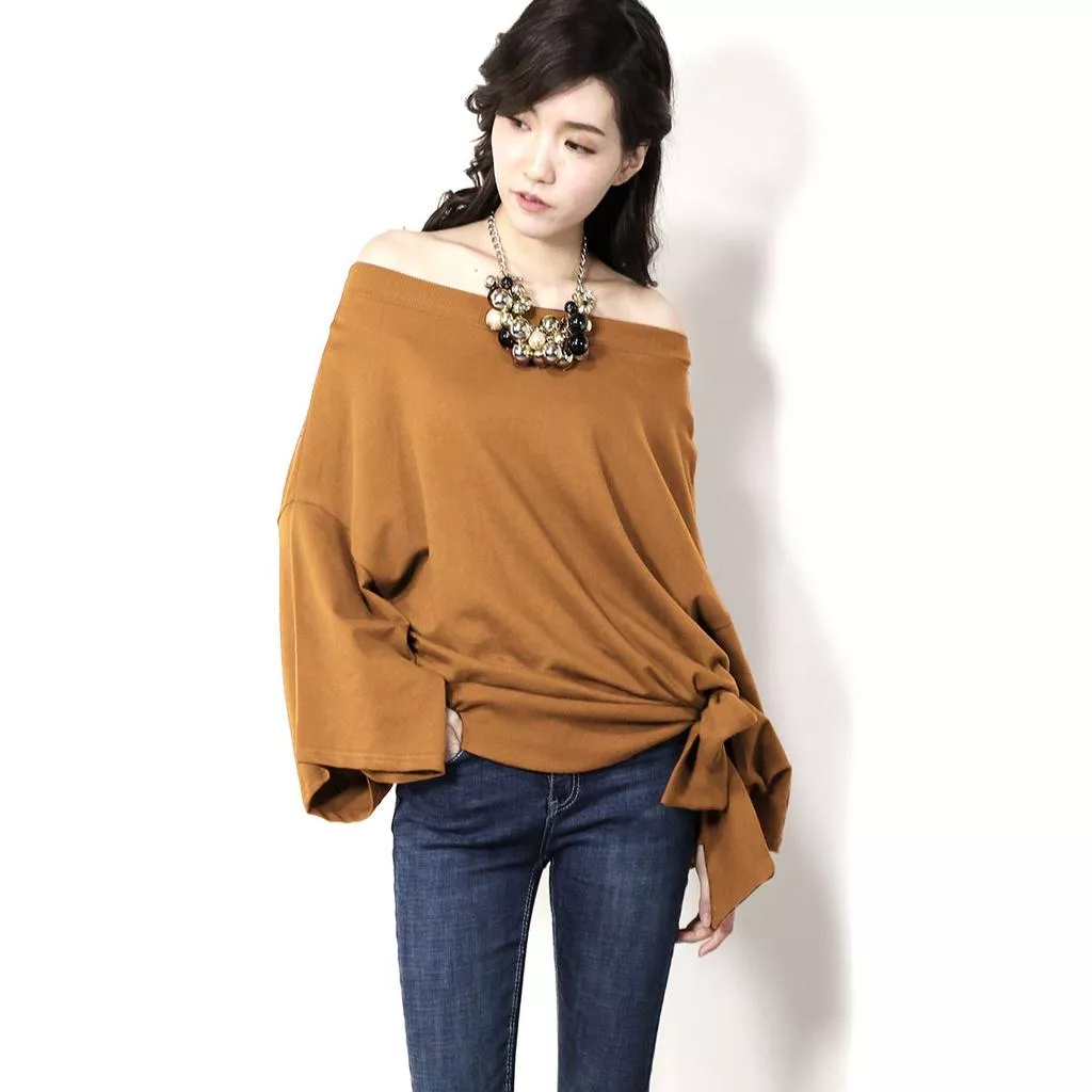 韓國空運 寬領口一字領露肩袖口開岔下擺綁帶蝴蝶結寬鬆顯瘦素面T恤女裝長袖上衣‧2色/k026