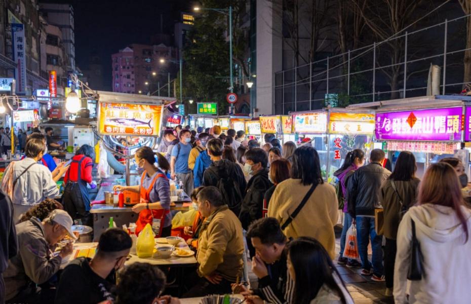 Cash, phone and travel essentials prepared for a Taiwan night market visit