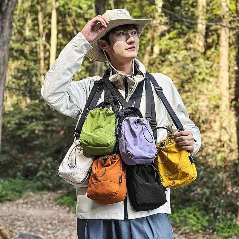 手機水杯一體包日式韓版多功能斜背包運動騎乘包便攜水壺包水杯包側背包