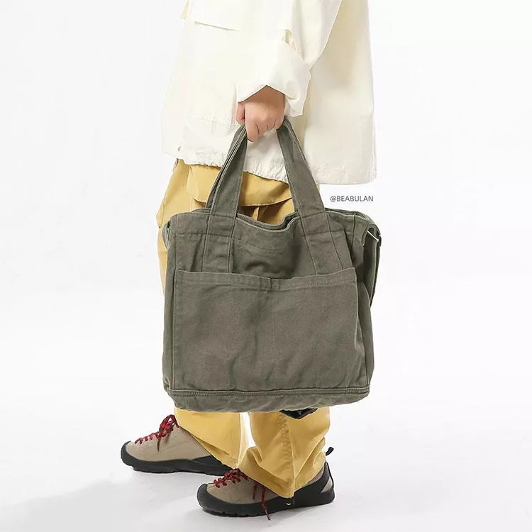 日系休閒水洗帆布斜背包男女通勤手提郵差包