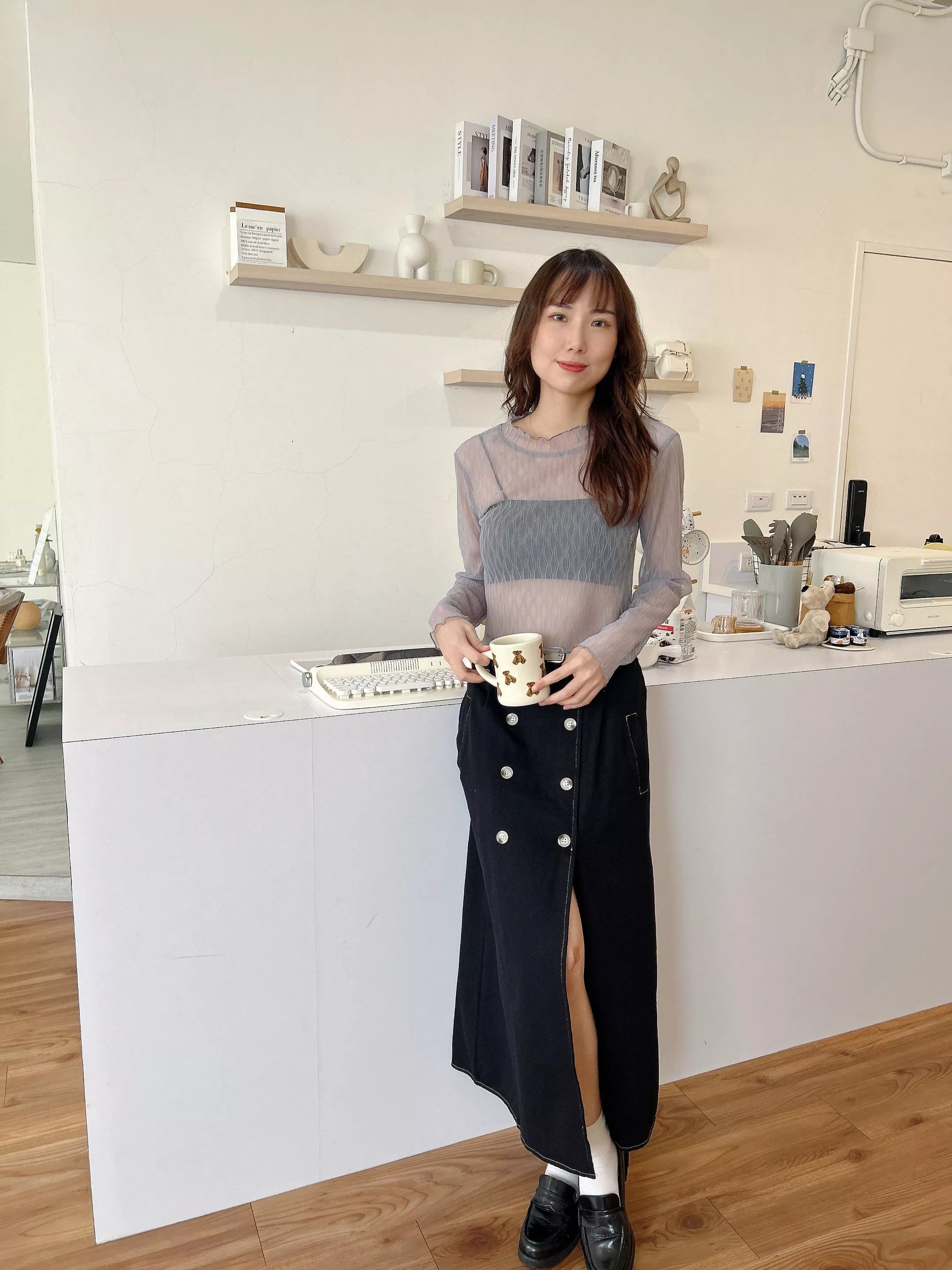 歐膩排釦前開衩附皮帶長裙 (2色)