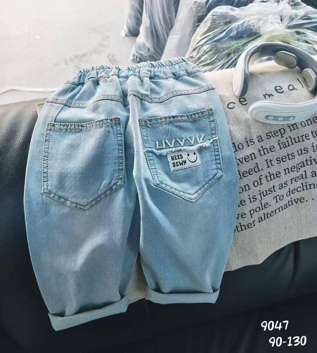 笑臉貼標牛仔褲