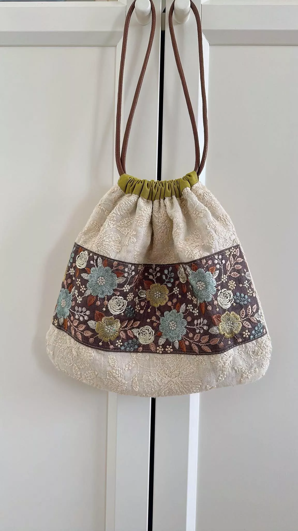 橄欖可可_限量刺繡_蠟繩束口袋
