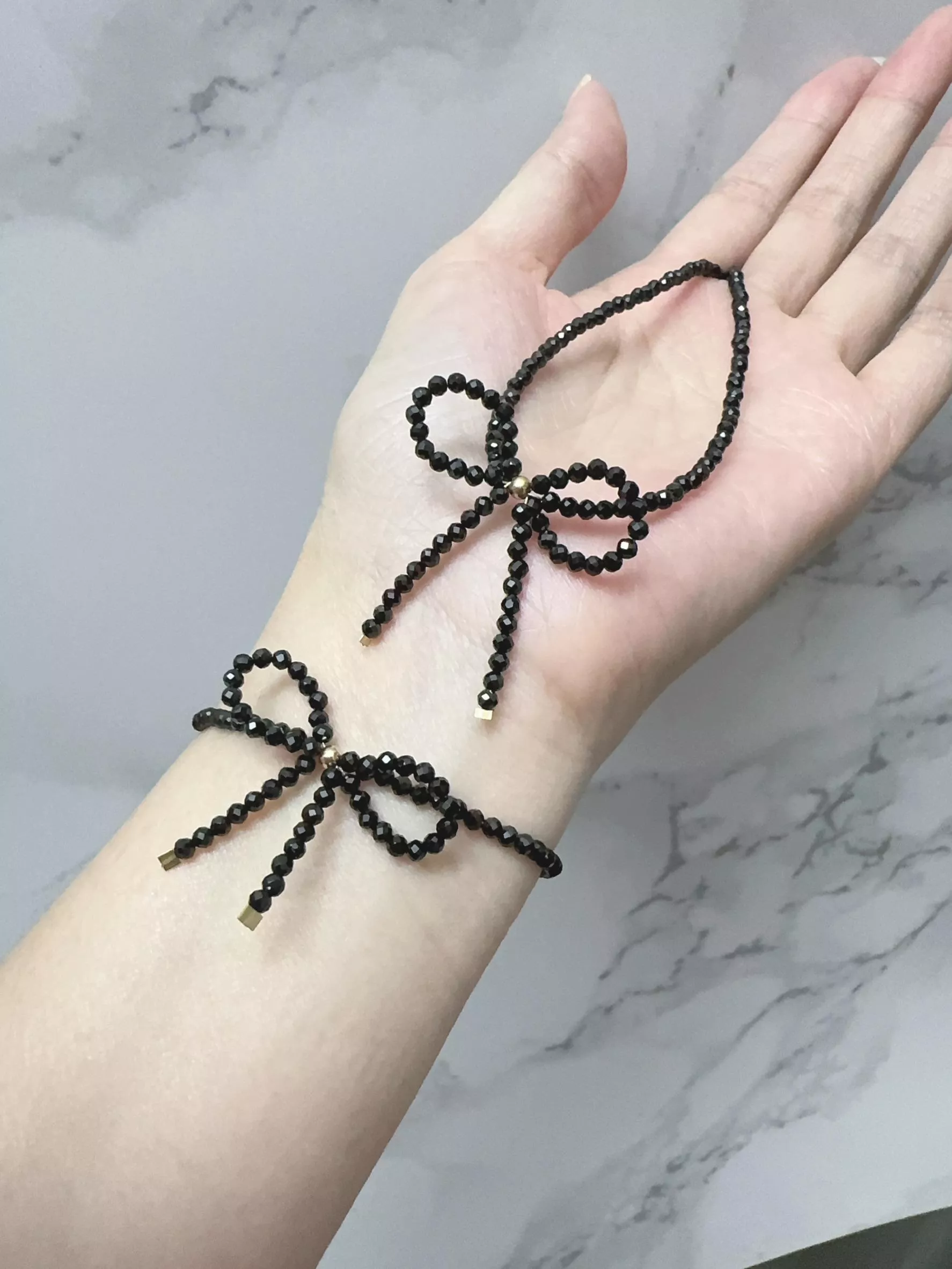 廣告檔活動 ♪ 天然黑尖晶蝴蝶結頸鍊、彈性手鍊組合