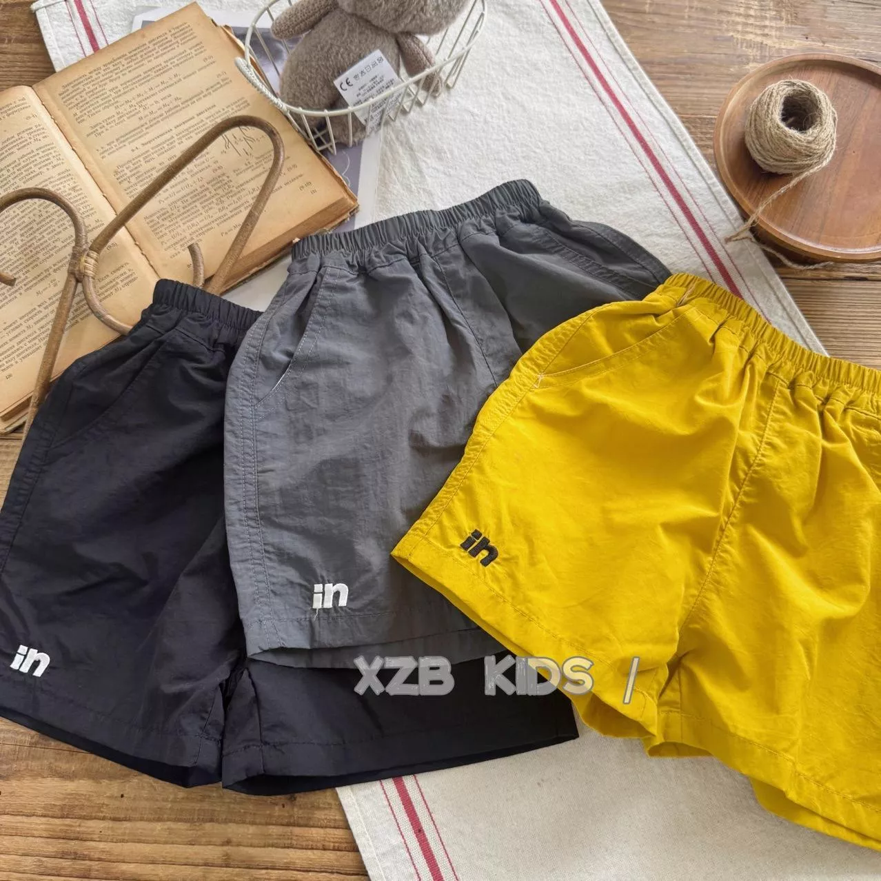 韓版預購 韓版男童 速乾薄款字母短褲（80～140）