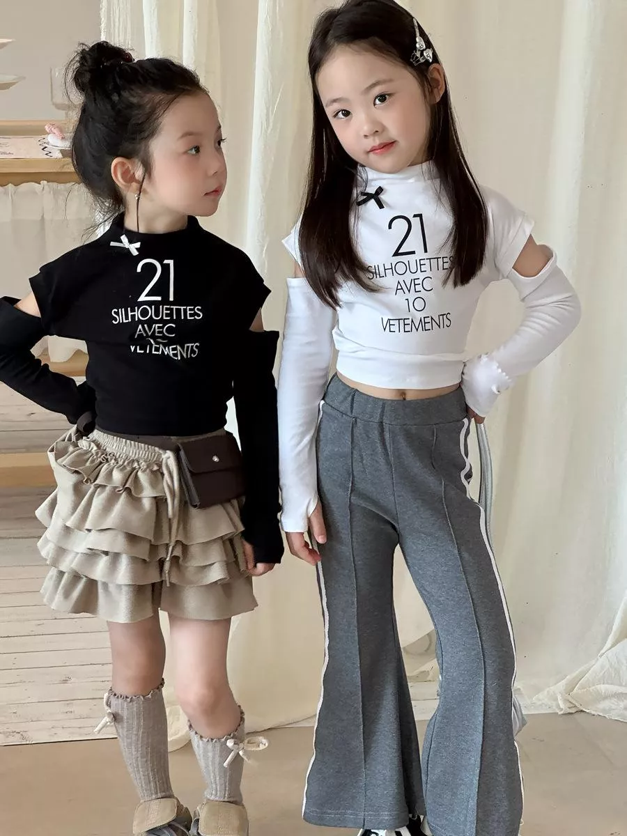 韓版預購 秋款-小辣妹字母露腰拼接袖短版上衣 (90~150cm)