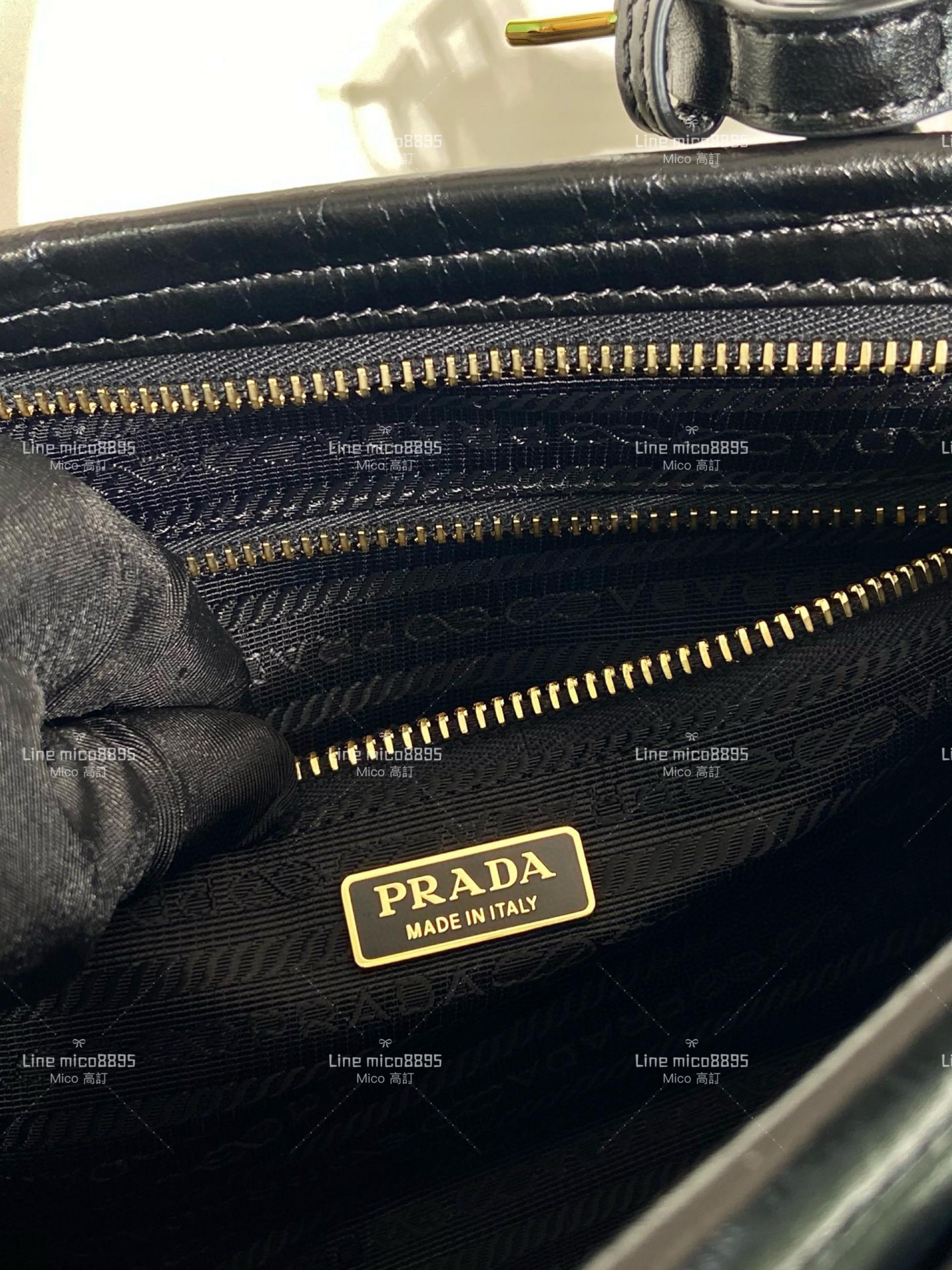 PRADA 復古圓桶包 LusSolf 黑色油臘皮 可手提斜跨包 32cm