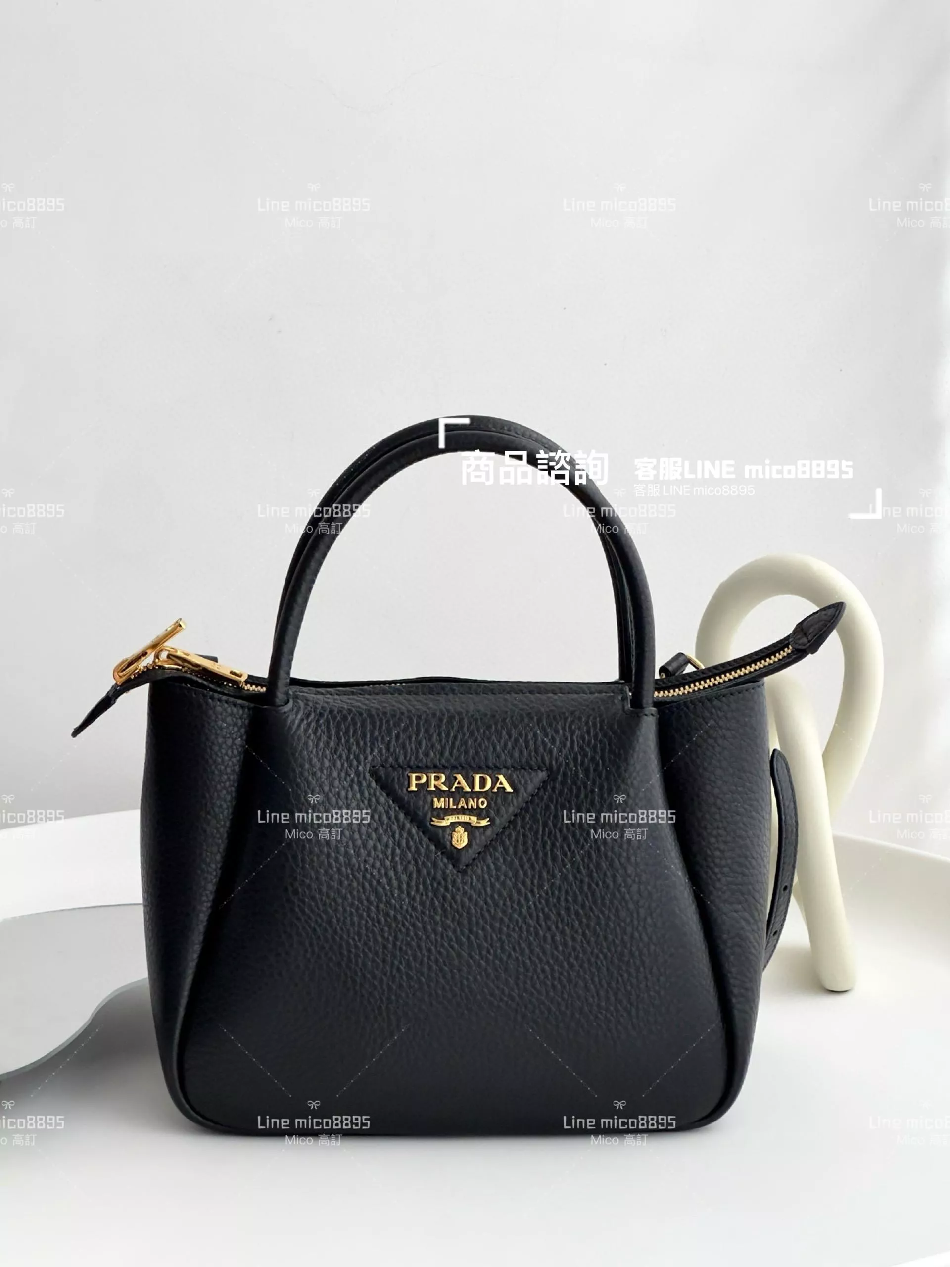 PRADA 普拉達｜小牛皮荔枝紋 黑色手提斜跨餃子包 23cm