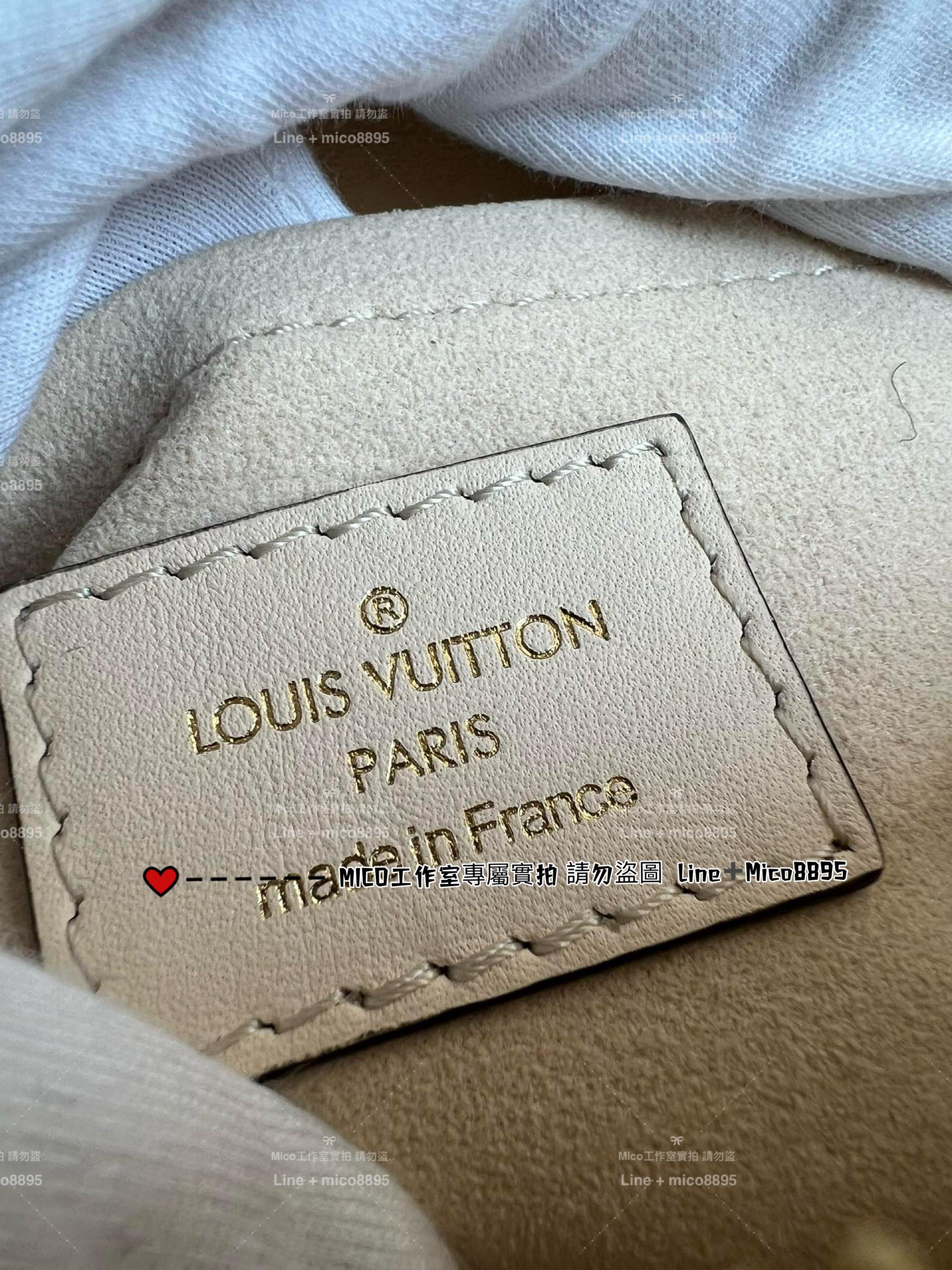 LV M23698 奶油白壓花粒面牛皮 ONTHEGO EAST WEST 手袋 25cm