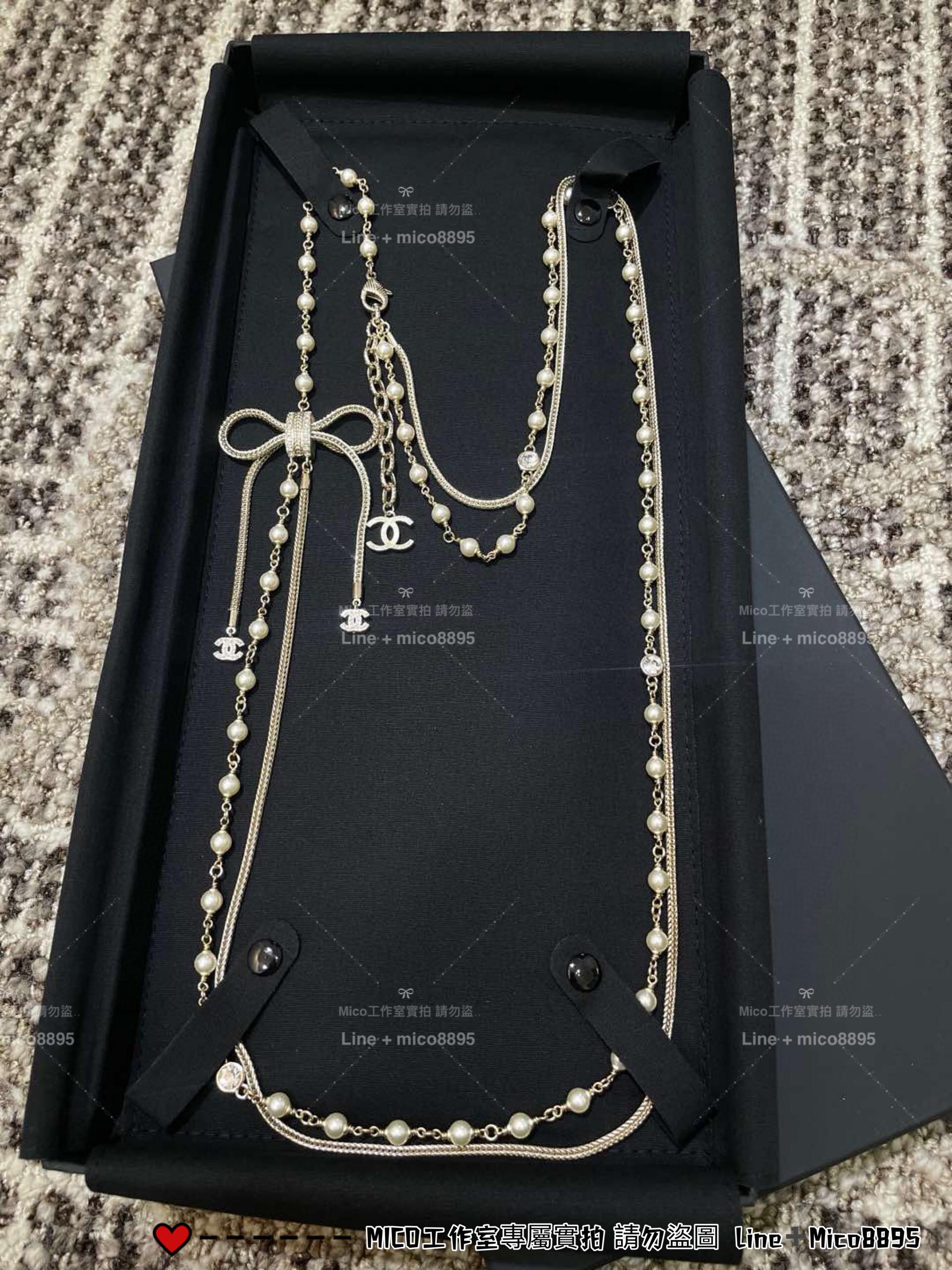 CHANEL | 24K 淡金色五金蝴蝶結拼接鏈條珍珠長款毛衣鏈