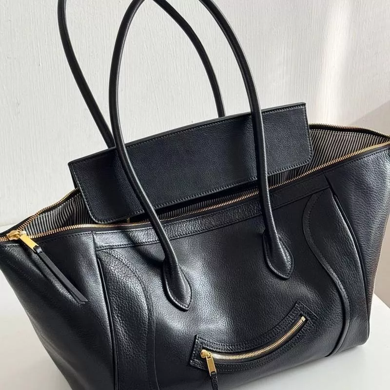 DANDT 四季通用~又颯又氣質~植鞣頭層牛皮笑臉包單肩包百搭真皮包（23 JULY THU） 歐美包款