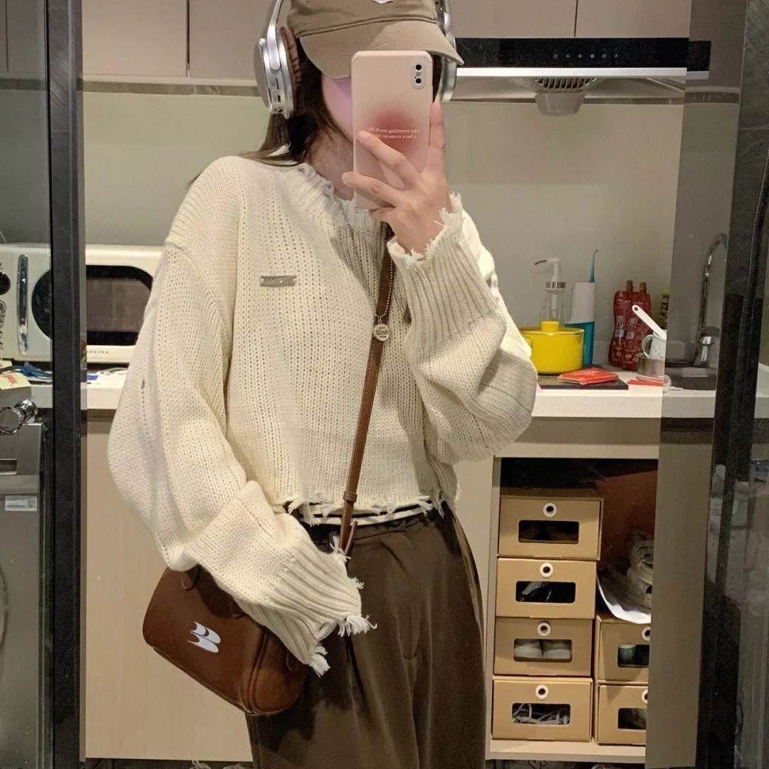 早秋破洞溫柔鹽系軟糯毛衣