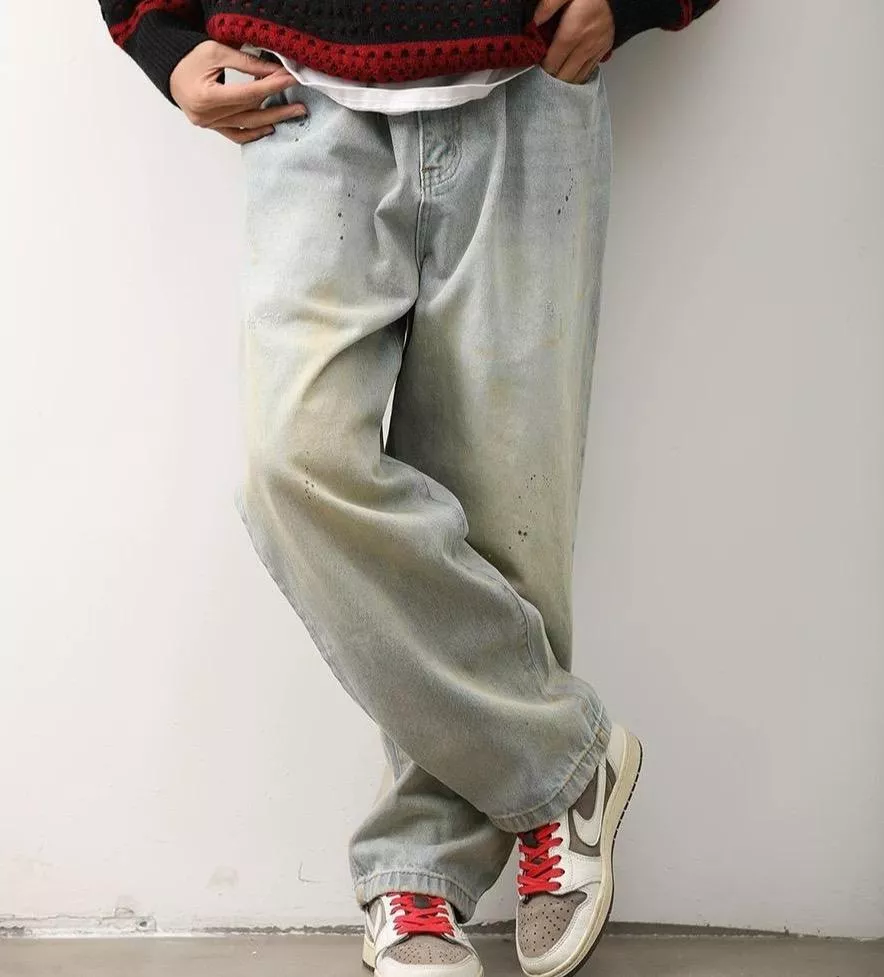 微潑漆淺色作舊牛仔褲